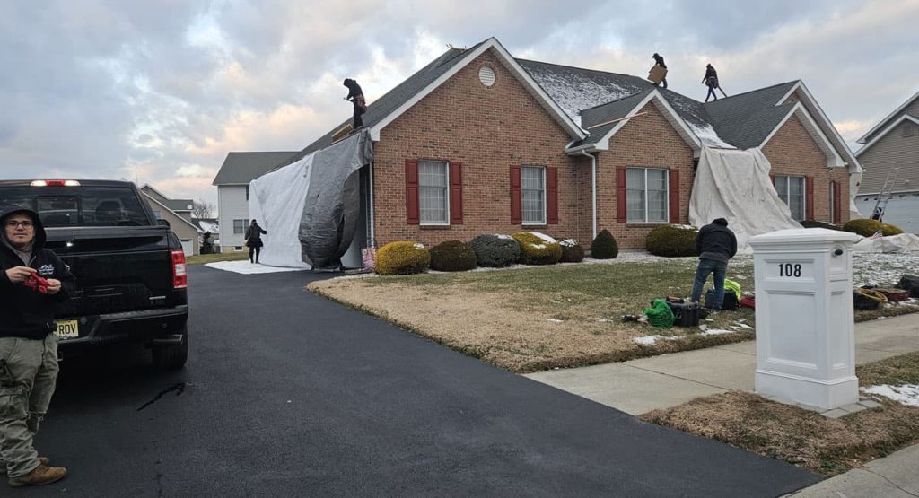 Tearing off the old roof in Bear, DE