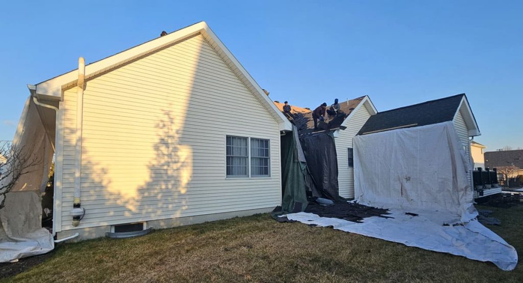 Tearing off old roof in Bear, DE