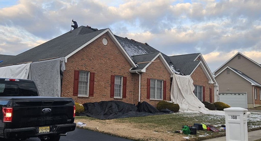 Tearing off the old roof in Bear, DE