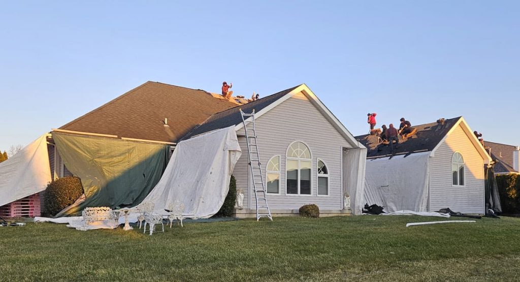 Tearing off old roof in Bear, DE