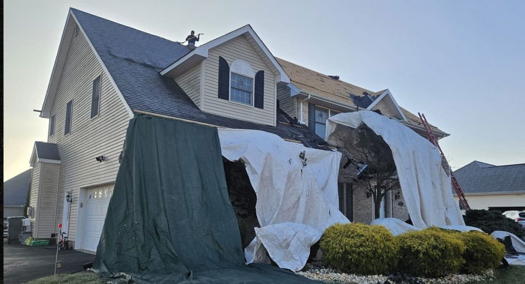 Tearing off old roof in Bear, DE