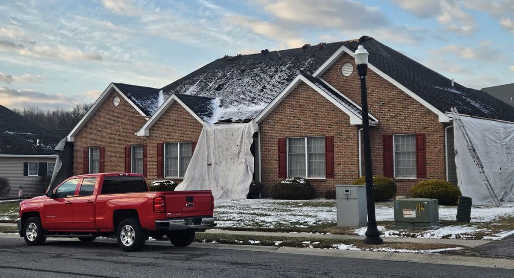 Tearing off the old roof in Bear, DE