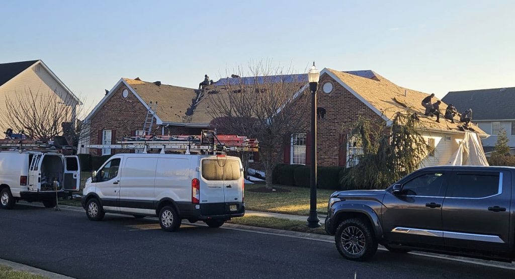 Tearing off old roof in Bear, DE