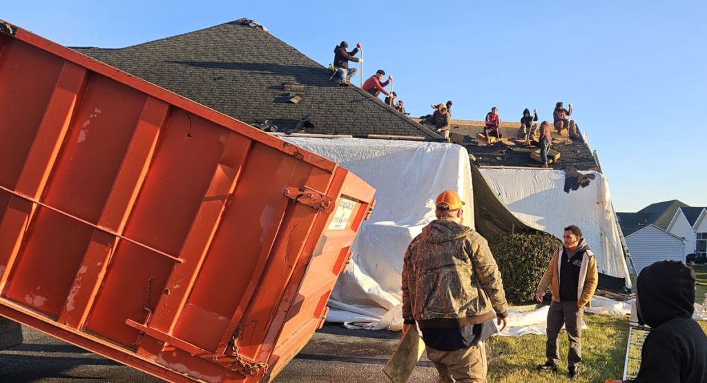 Tearing off old roof in Bear, DE
