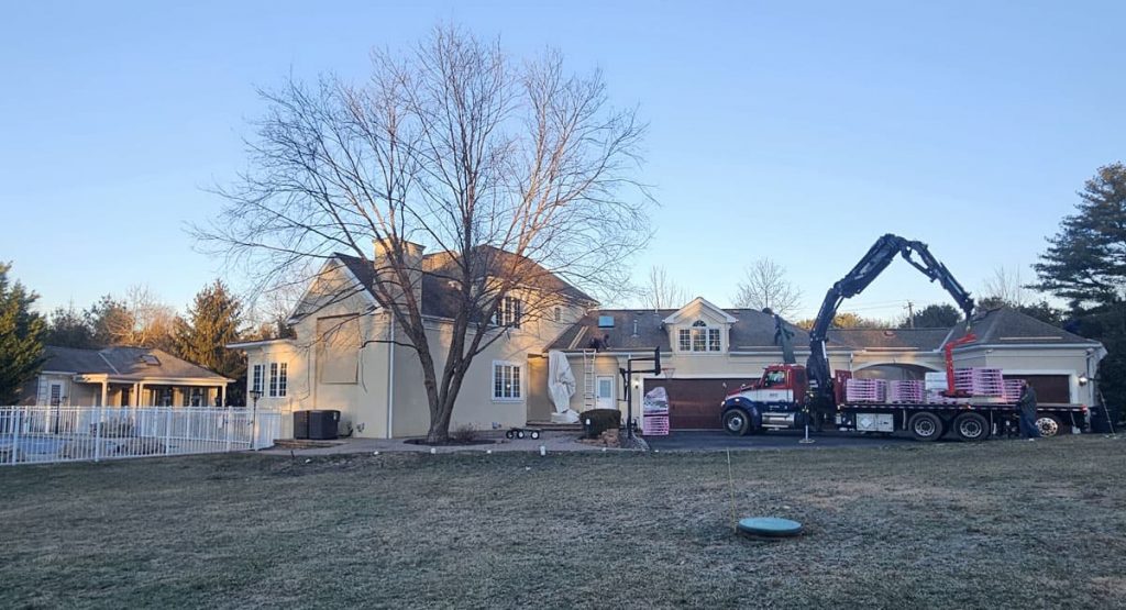 Tearing off old roof in Wilmington, DE