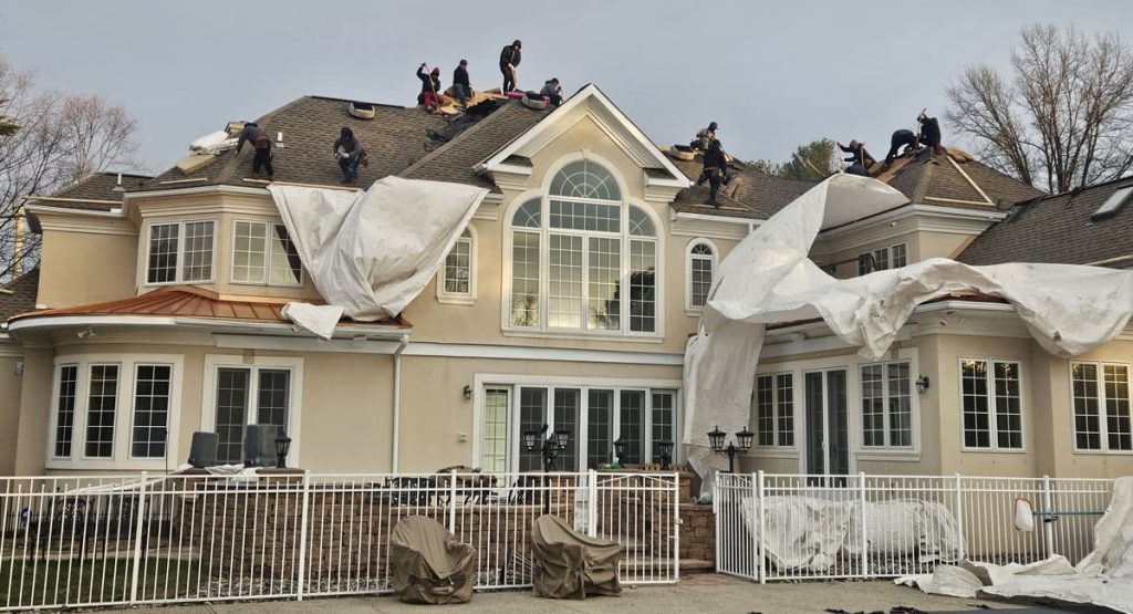 Tearing off old roof in Wilmington, DE