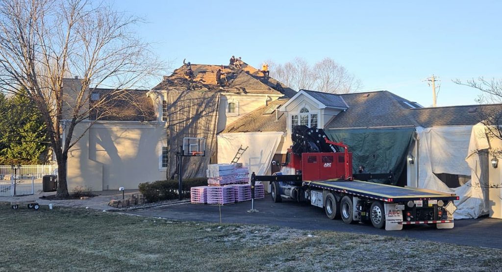 Tearing off old roof in Wilmington, DE