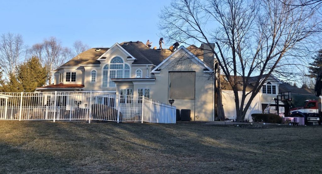 Tearing off old roof in Wilmington, DE