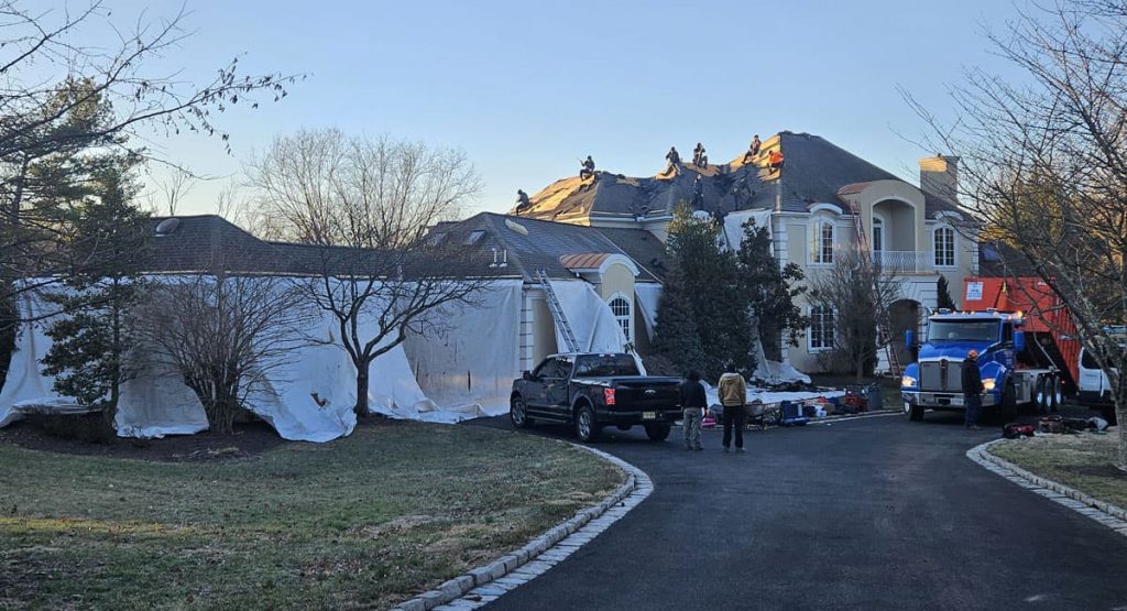 Tearing off old roof in Wilmington, DE