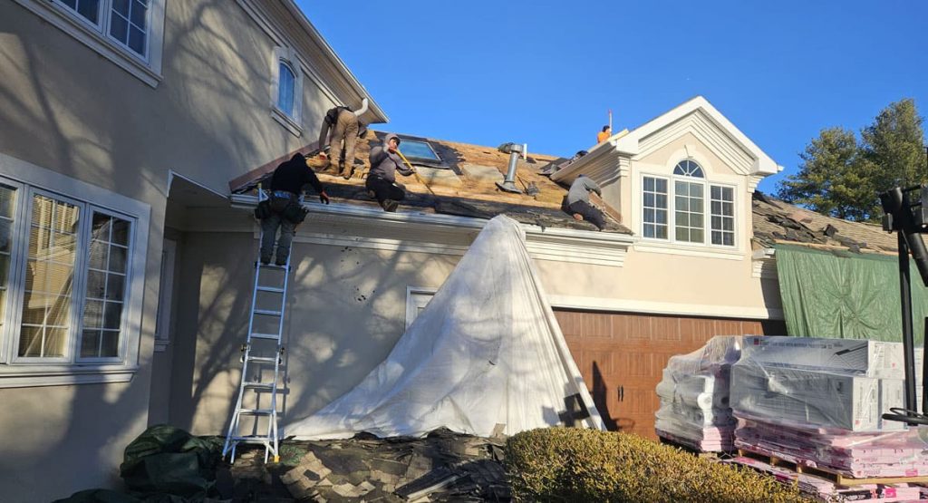 Tearing off old roof in Wilmington, DE