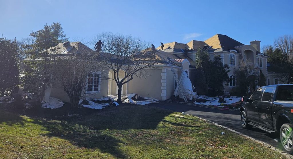 Tearing off old roof in Wilmington, DE