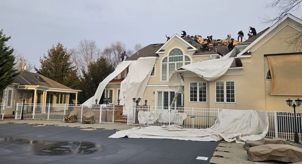 Tearing off old roof in Wilmington, DE