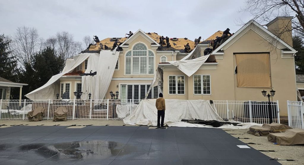 Tearing off old roof in Wilmington, DE