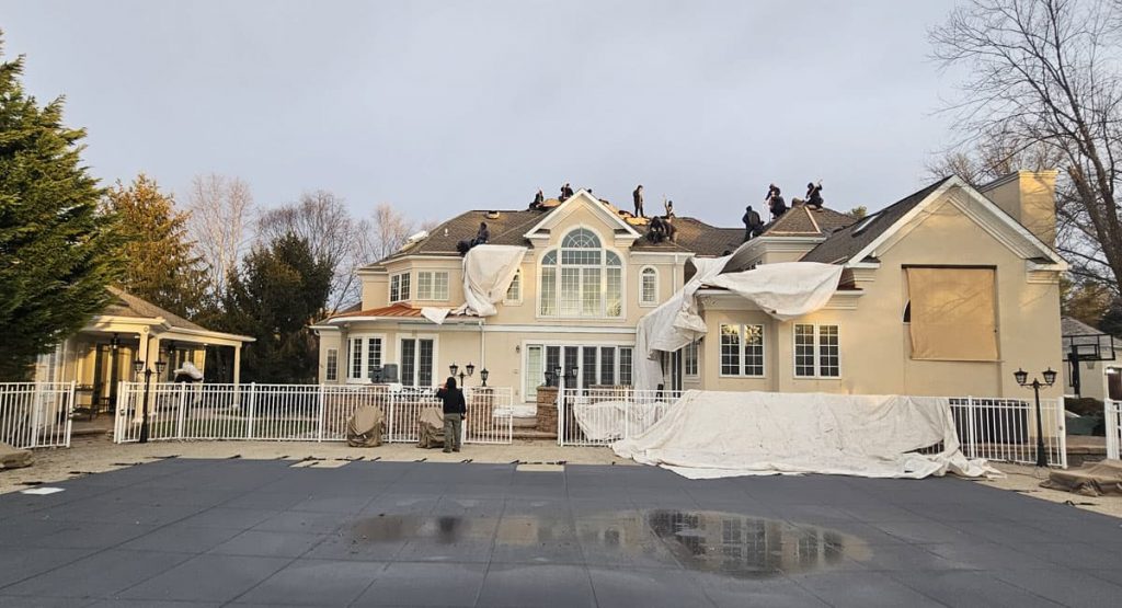 Tearing off old roof in Wilmington, DE
