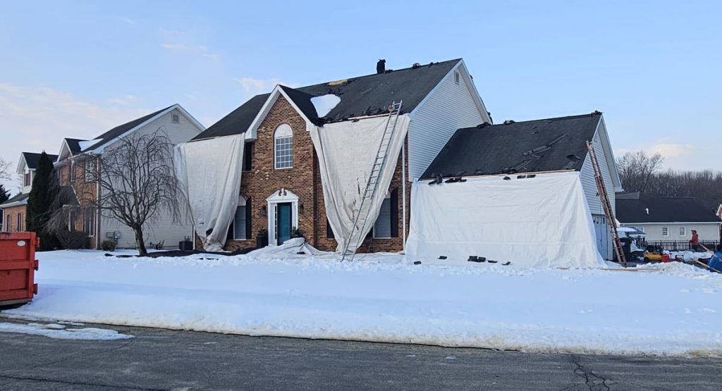 Tearing off the old roof in Bear, DE