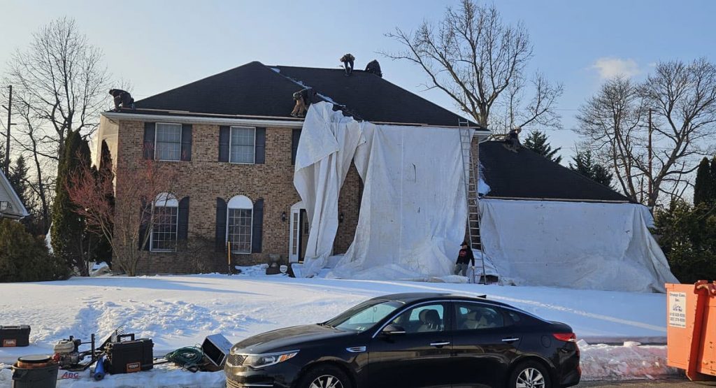 Tearing off the old roof in Bear, DE