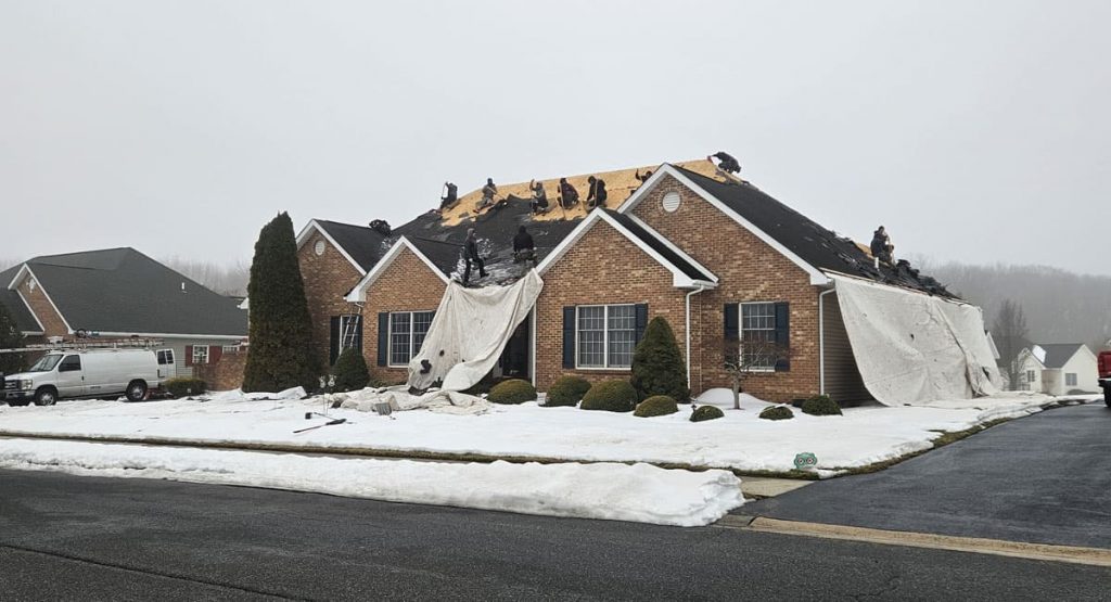 Tearing off the old roof in Bear, DE