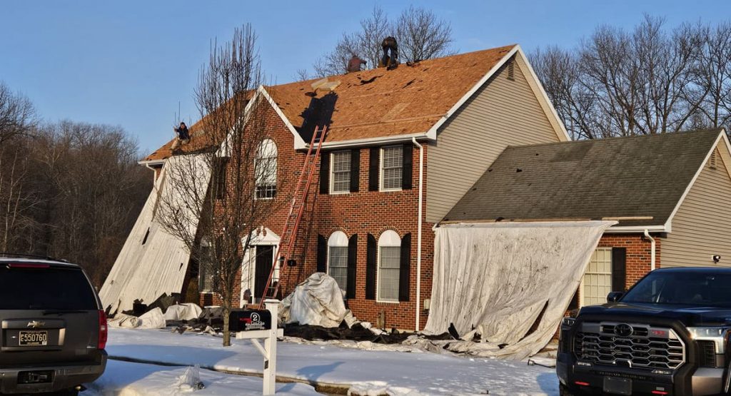 Tearing off the old roof in Bear, DE