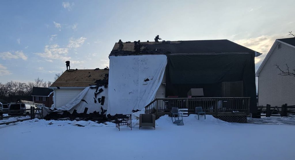 Tearing off the old roof in Bear, DE
