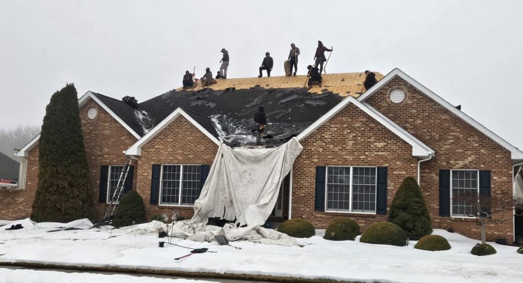 Tearing off the old roof in Bear, DE