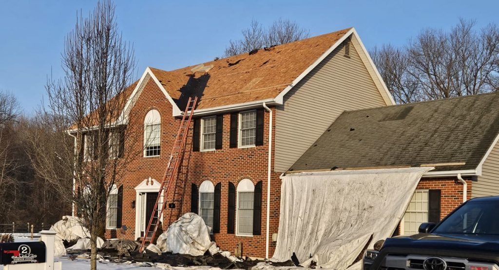 Tearing off the old roof in Bear, DE