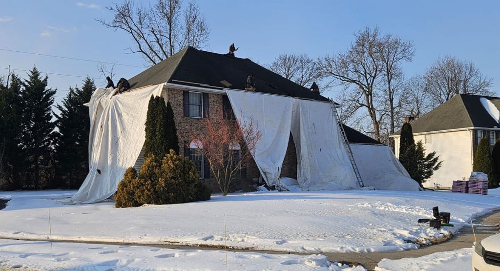 Tearing off the old roof in Bear, DE