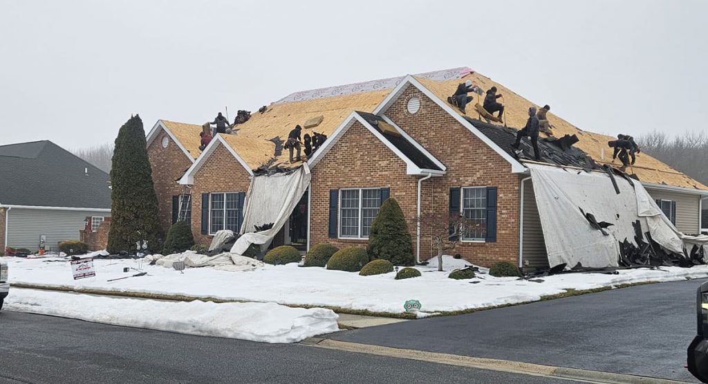 Tearing off the old roof in Bear, DE