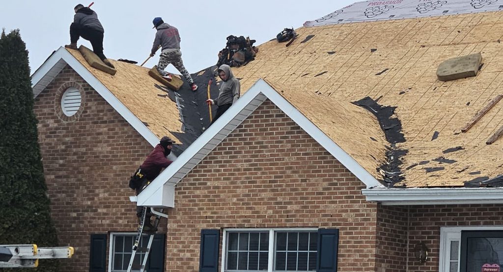 Tearing off the old roof in Bear, DE