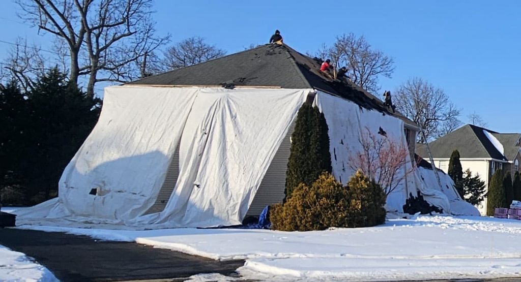 Tearing off the old roof in Bear, DE