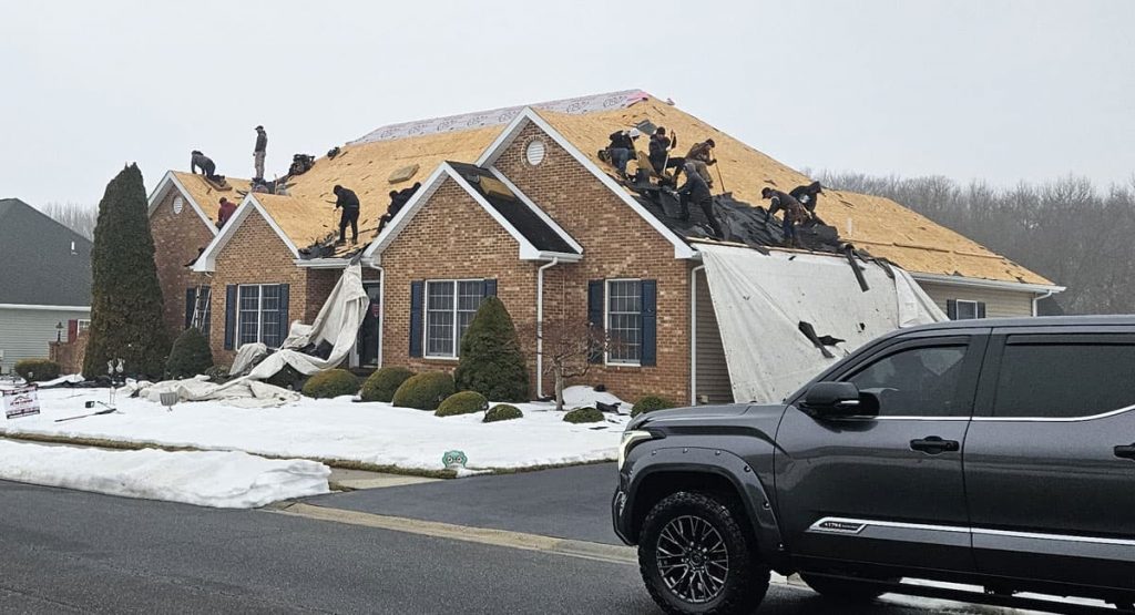 Tearing off the old roof in Bear, DE