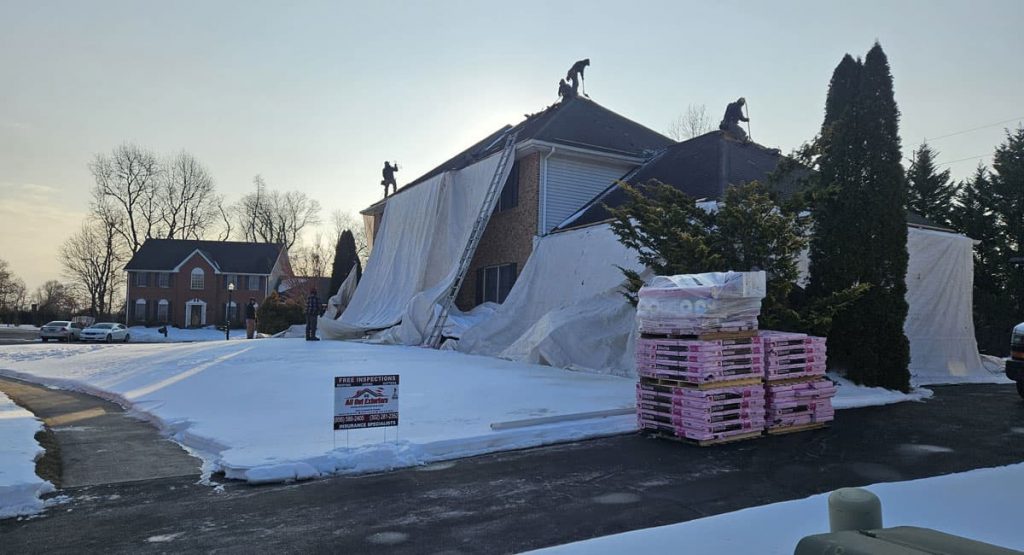 Tearing off the old roof in Bear, DE