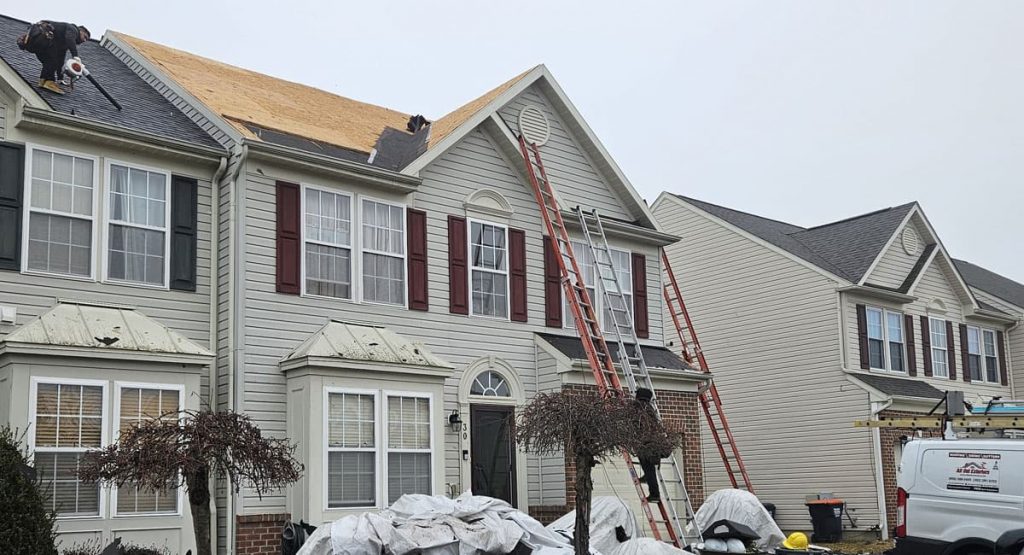 Tearing off old roof in Middletown, DE