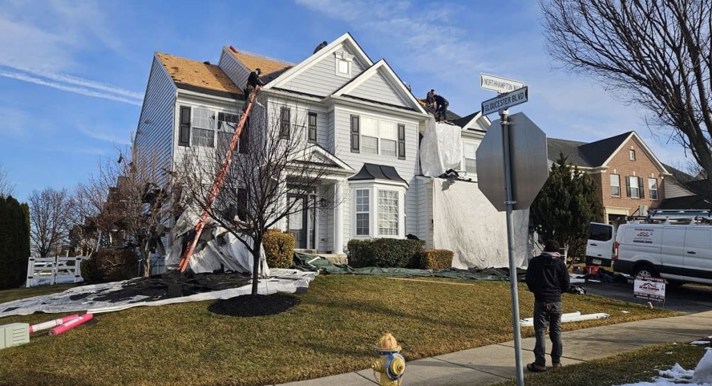 Tearing off old roof in Middletown, DE