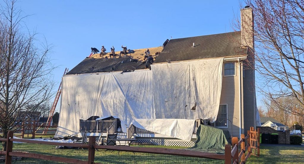 Tearing off the old roof in Bear, DE