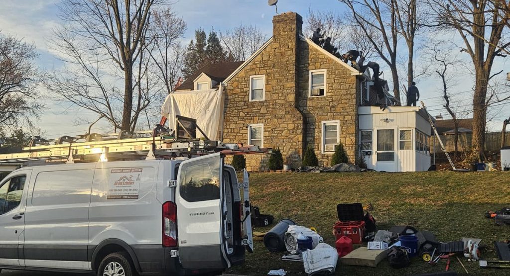 Tearing off the old roof in Elsmere, DE