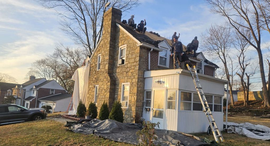 Tearing off the old roof in Elsmere, DE