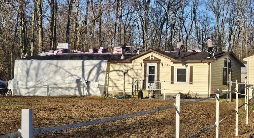 Tearing off the old roof in Felton, DE
