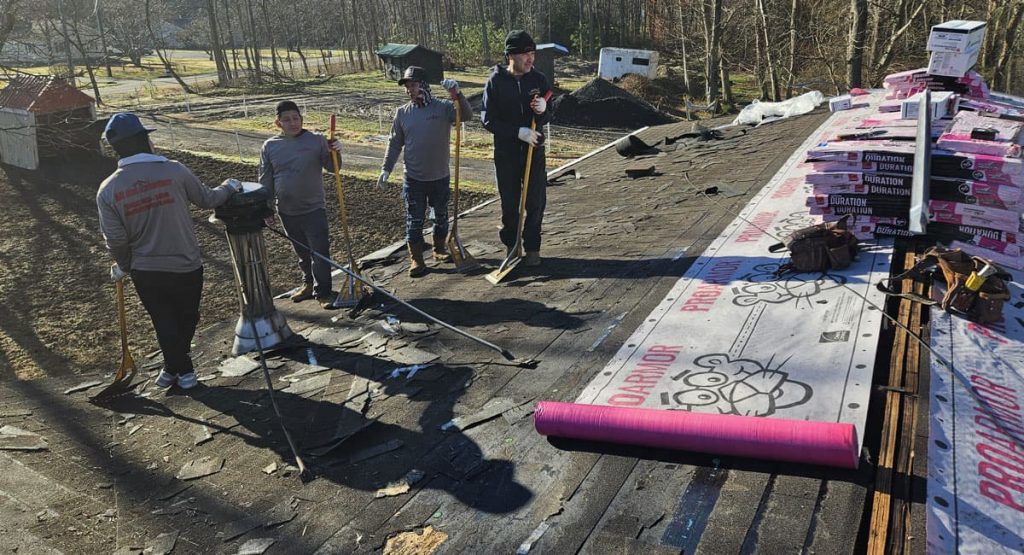 The Guys preparing to tear off the roof in Felton, DE