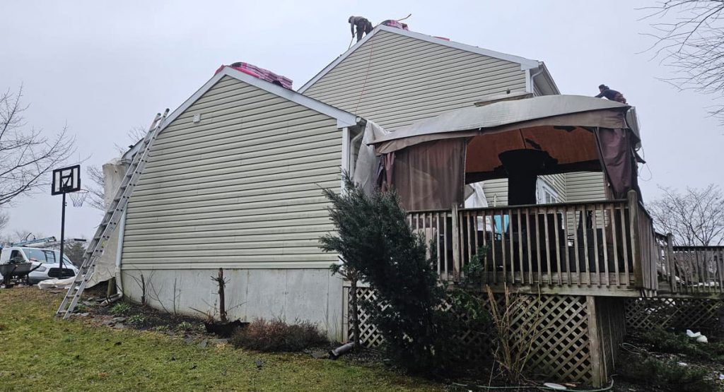 Tearing off the old roof in Middletown, DE