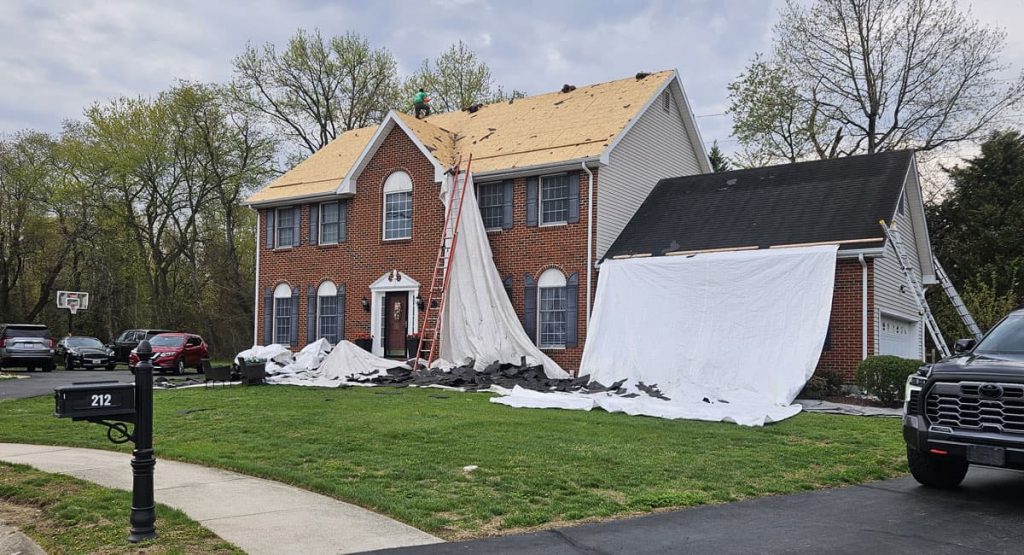 Tearing off old roof in Bear, DE
