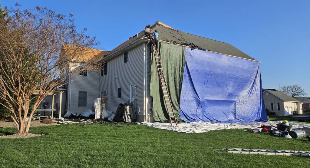 Tearing off the old roof in Bear, DE