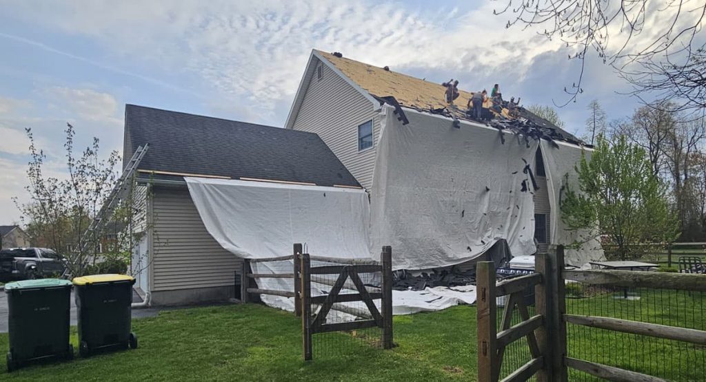 Tearing off old roof in Bear, DE