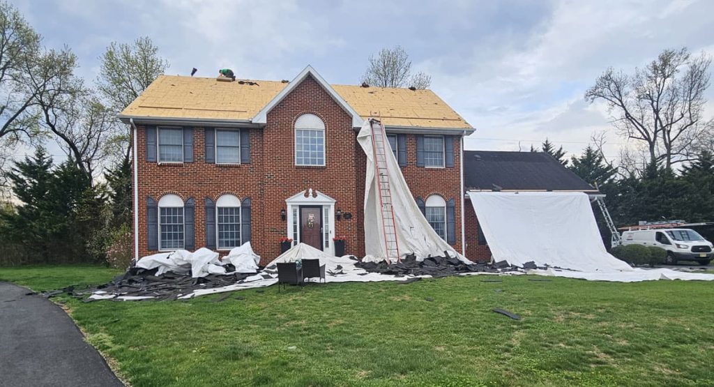 Tearing off old roof in Bear, DE