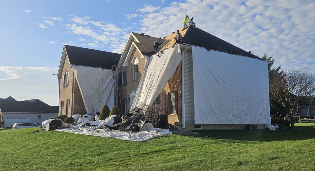 Tearing off the old roof in Bear, DE