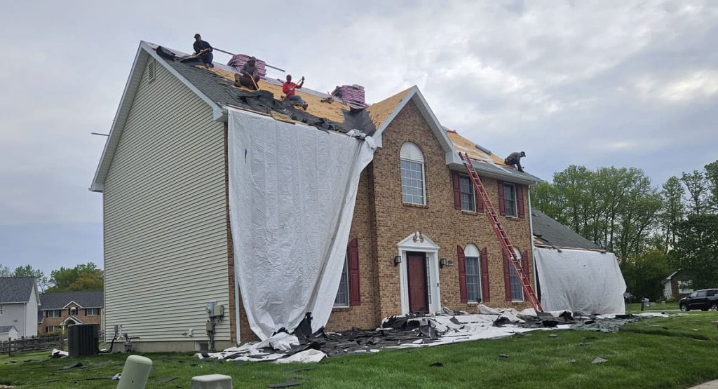 Tearing off the old roof in Bear, DE