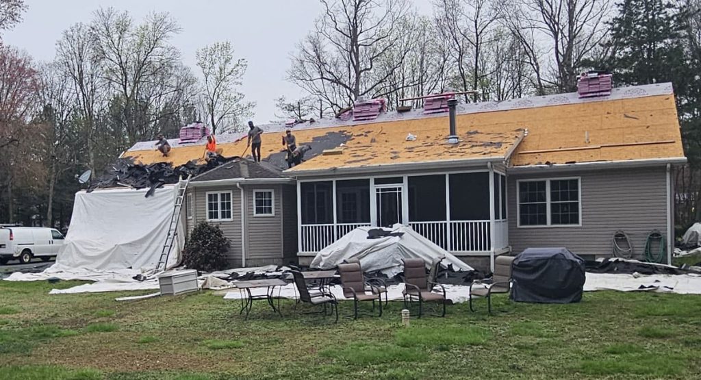 Tearing off the old roof in Greenwood, DE