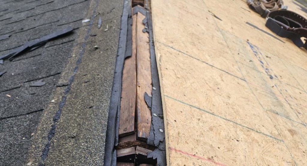 Tearing off old roof in Middletown, DE