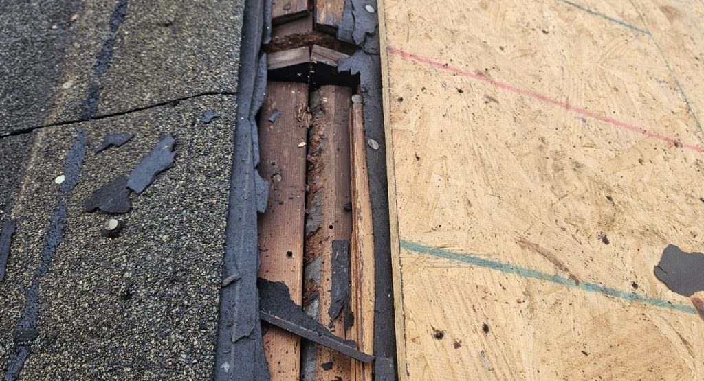 Tearing off old roof in Middletown, DE