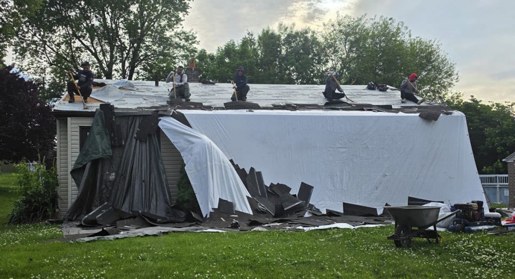 Tearing off old roof in Aston, PA