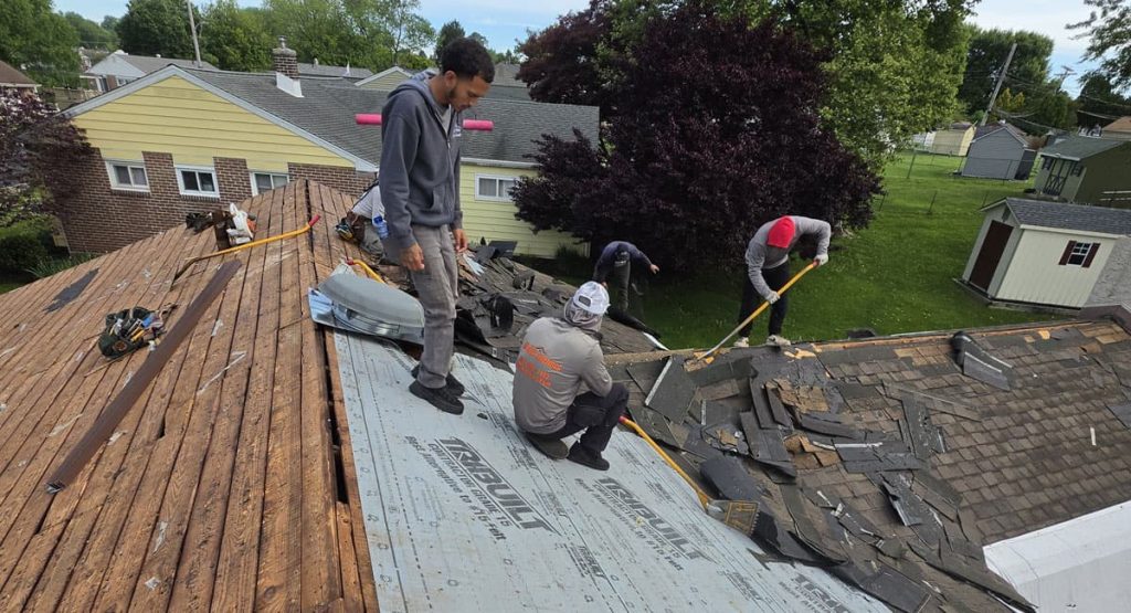 Tearing off old roof in Aston, PA